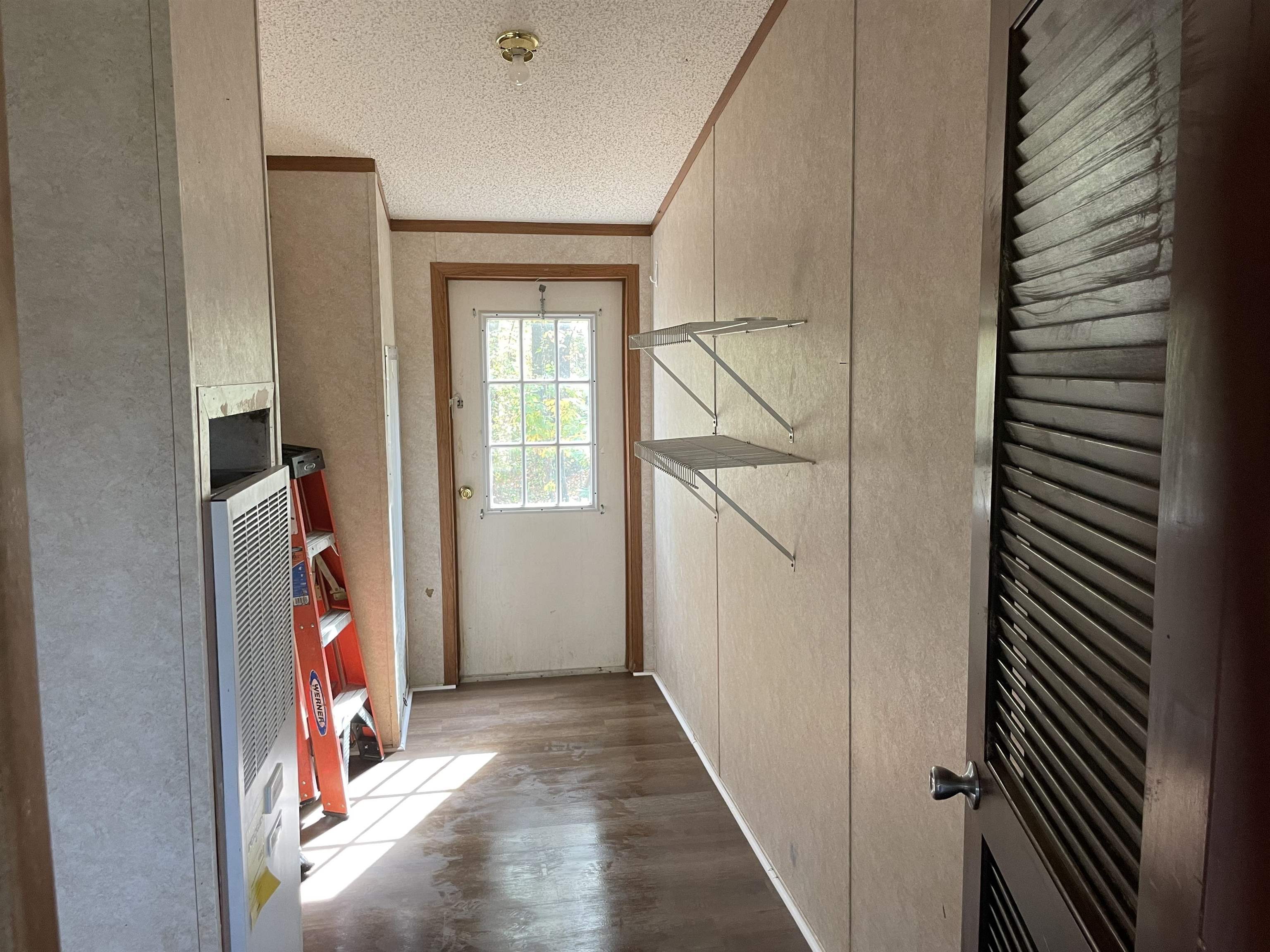 709 Robertson Road Mason, TN 38049 - Photo 13 of 16 a view of an entryway with workspace