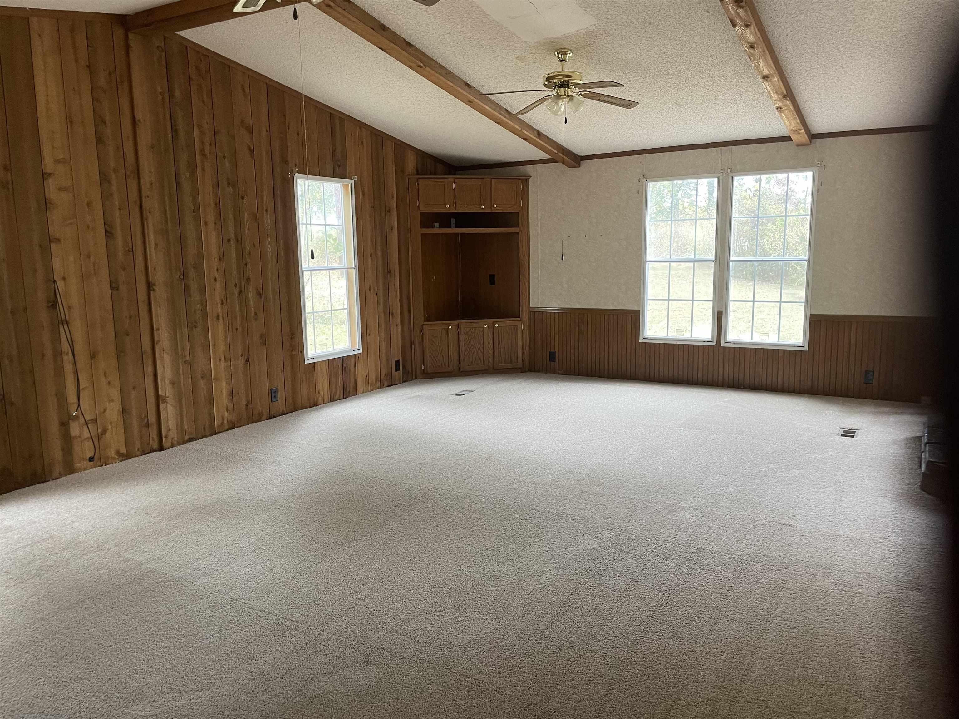 709 Robertson Road Mason, TN 38049 - Photo 3 of 16 a view of a livingroom with a staircase