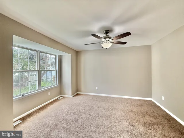 a kitchen with a sink and a stove top oven