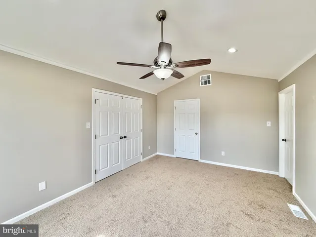 a view of a big room with wooden floor