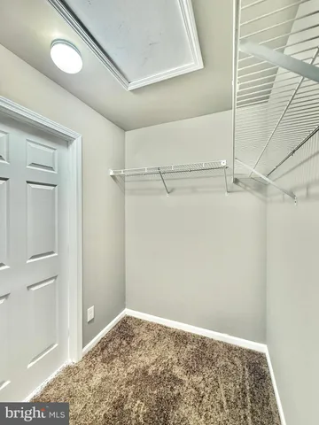 a view of house with backyard