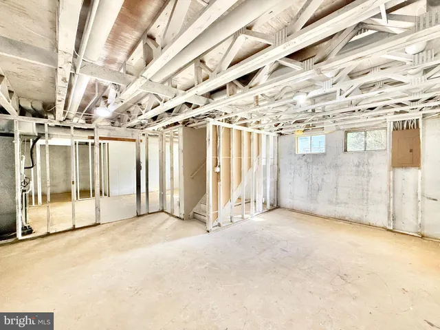 a view of a tree in front of a house