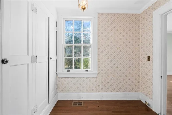 a view of entryway with wooden floor
