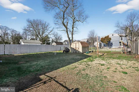 a view of backyard with green space