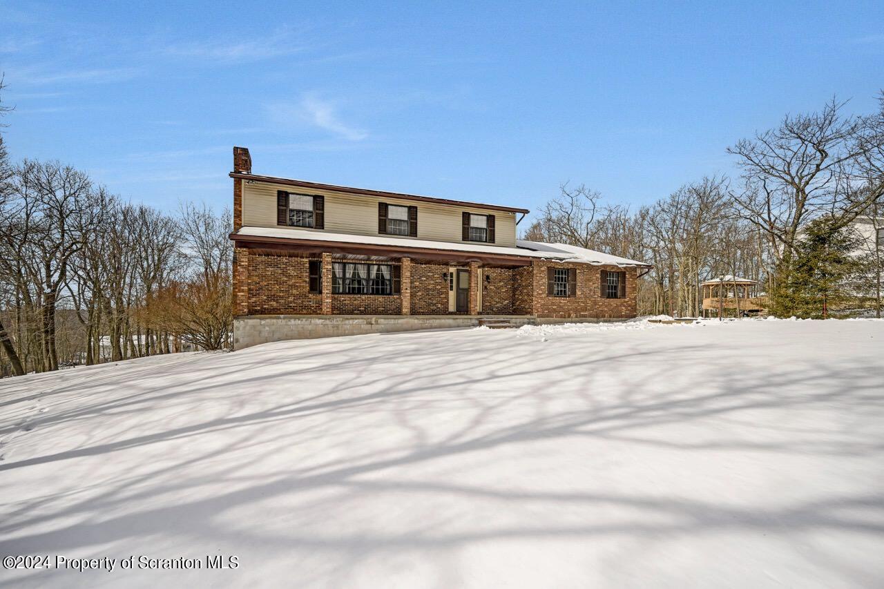 820 Forest Road Lake Ariel, PA 18436 - Photo 54 of 58 a front view of a house with a outdoor space