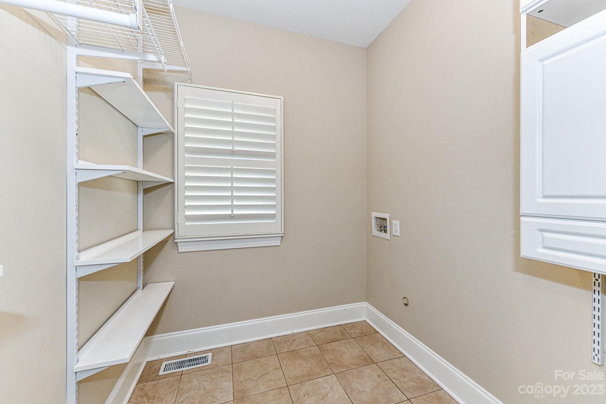 151 Maple View Drive Troutman, NC 28166 - Photo 20 of 43 a view of an empty room with stairs