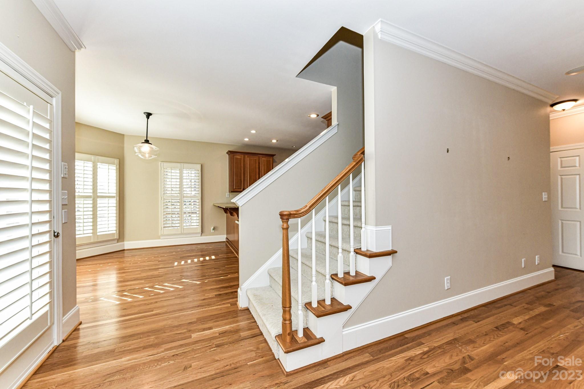 151 Maple View Drive Troutman, NC 28166 - Photo 21 of 43 a view of entryway and hall with wooden floor
