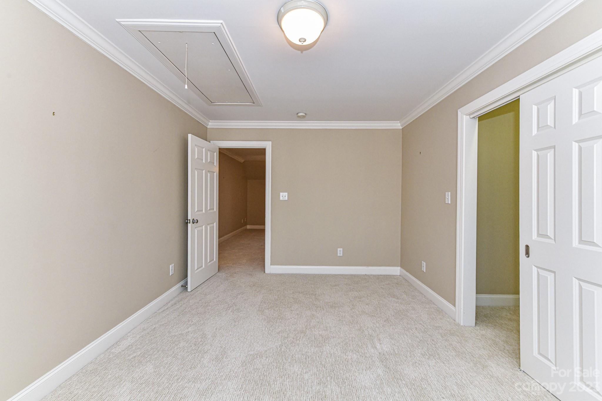 151 Maple View Drive Troutman, NC 28166 - Photo 25 of 43 a view of an empty room with a window