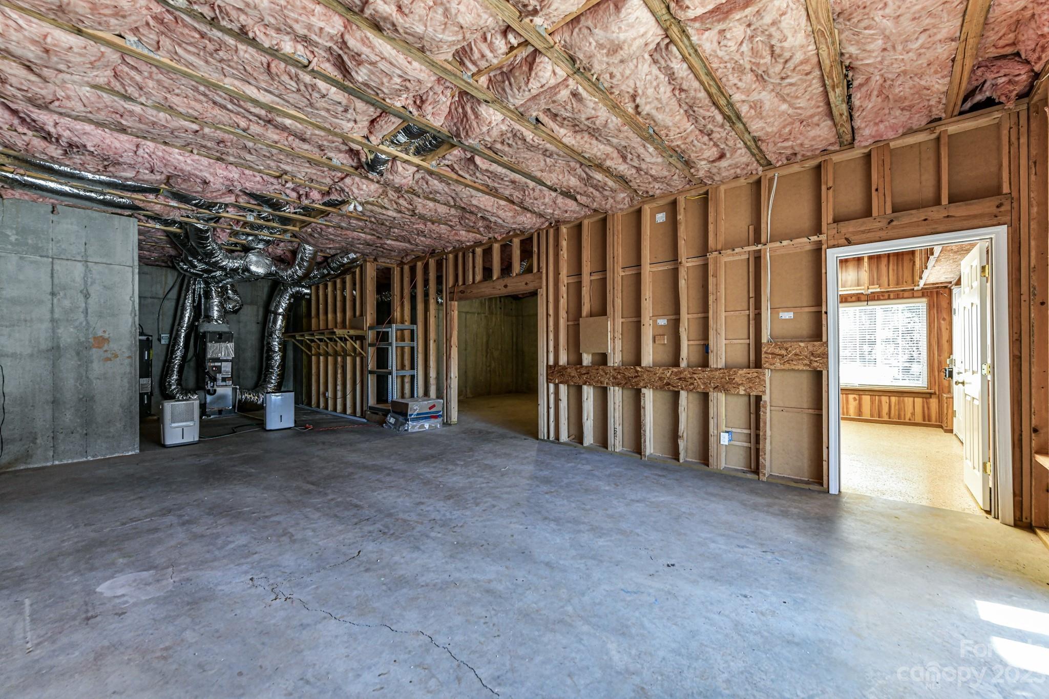 151 Maple View Drive Troutman, NC 28166 - Photo 27 of 43 a view of an empty room with wooden walls