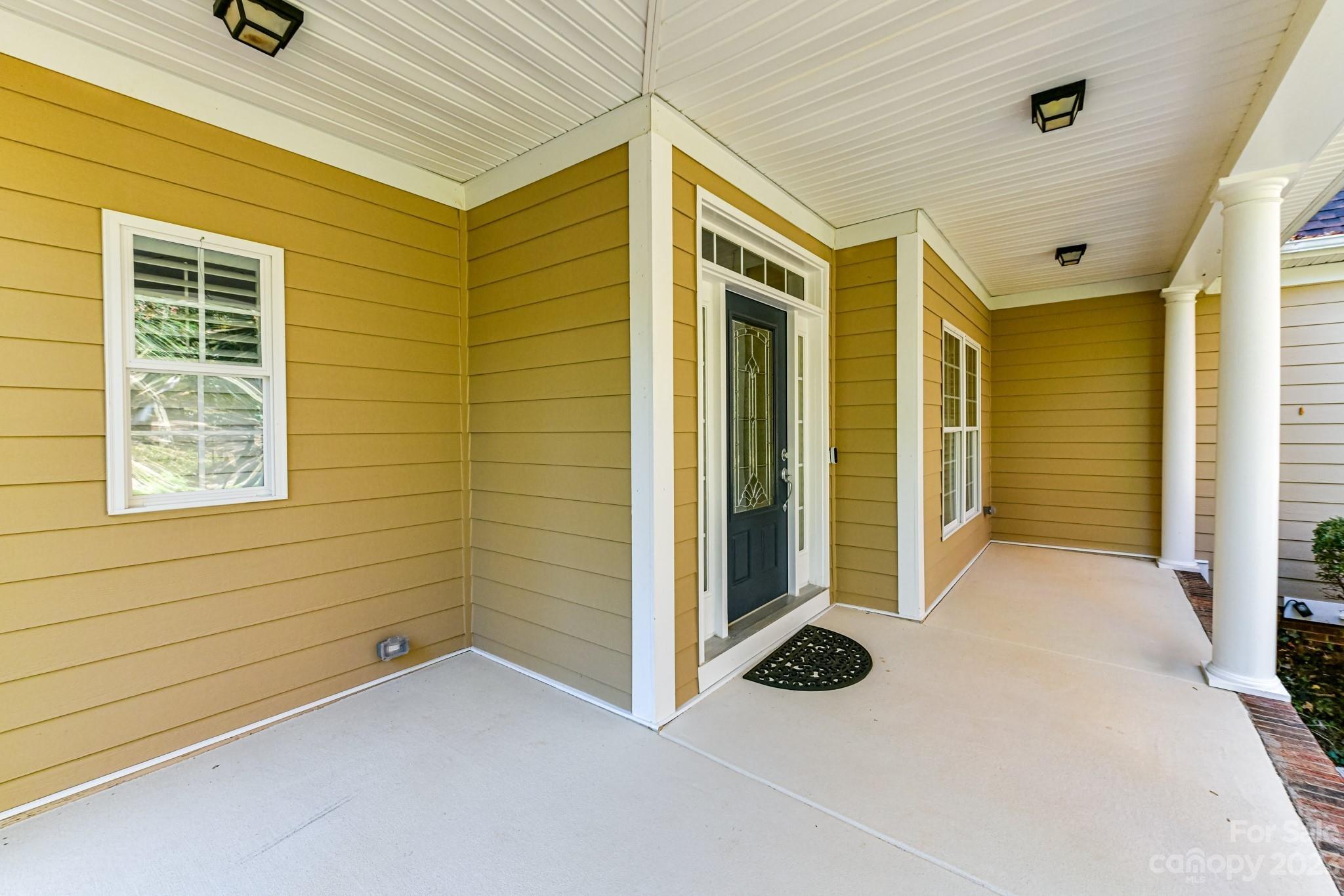 151 Maple View Drive Troutman, NC 28166 - Photo 3 of 43 a view of a door of the house