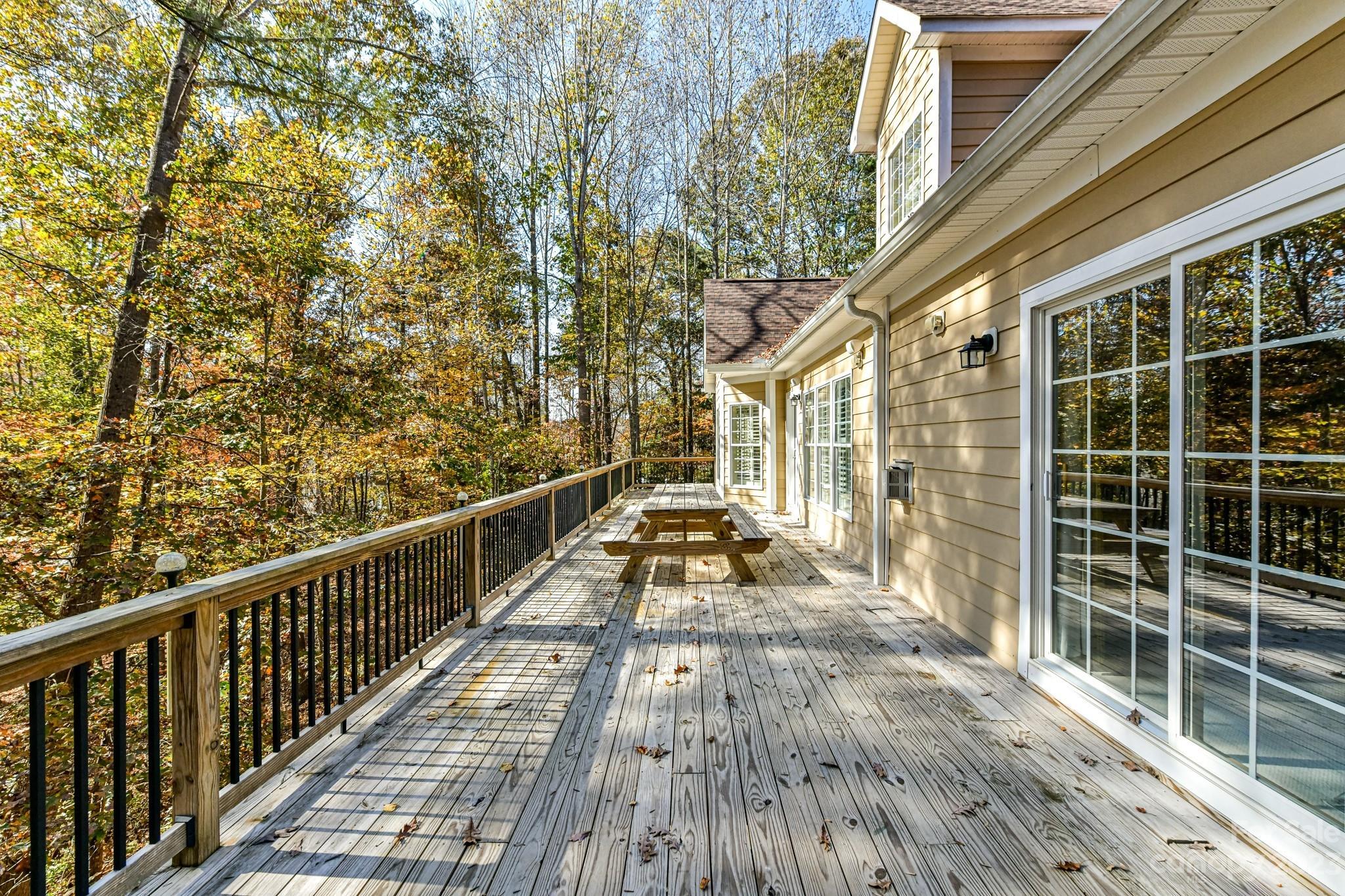151 Maple View Drive Troutman, NC 28166 - Photo 33 of 43 a view of balcony with wooden floor and fence