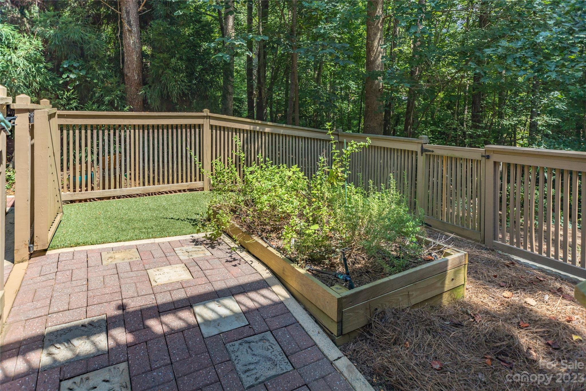 151 Maple View Drive Troutman, NC 28166 - Photo 35 of 43 a view of a backyard with wooden fence