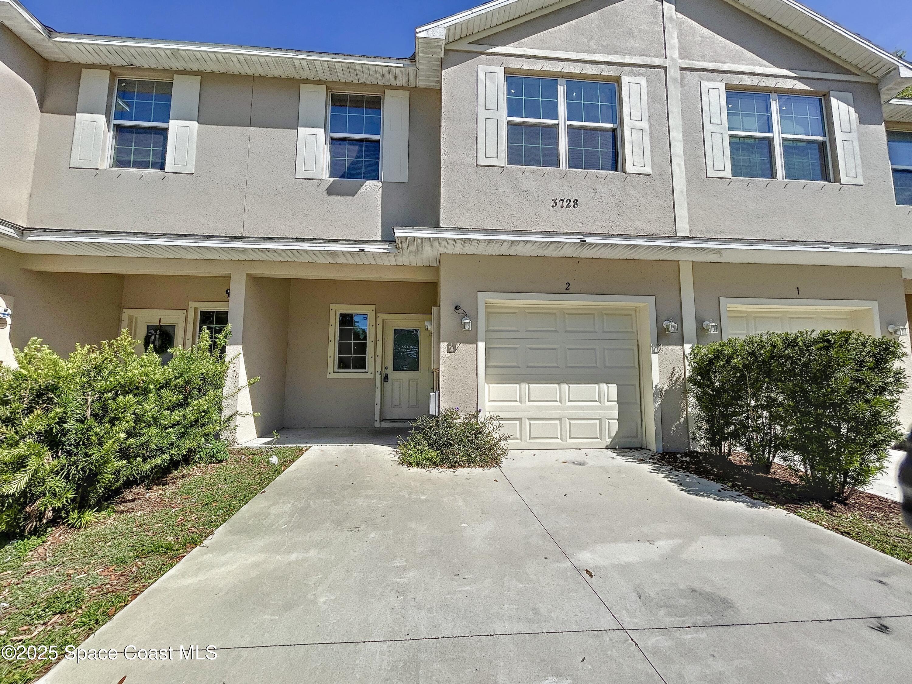 3737 Chambers Lane, Unit 8 Cocoa, FL 32926 - Photo 1 of 24 a front view of a house