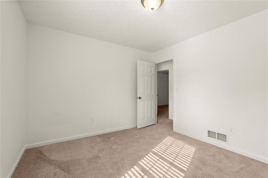 5984 Brookside Court Southeast Mableton, GA 30126 - Photo 14 of 21 a view of an empty room