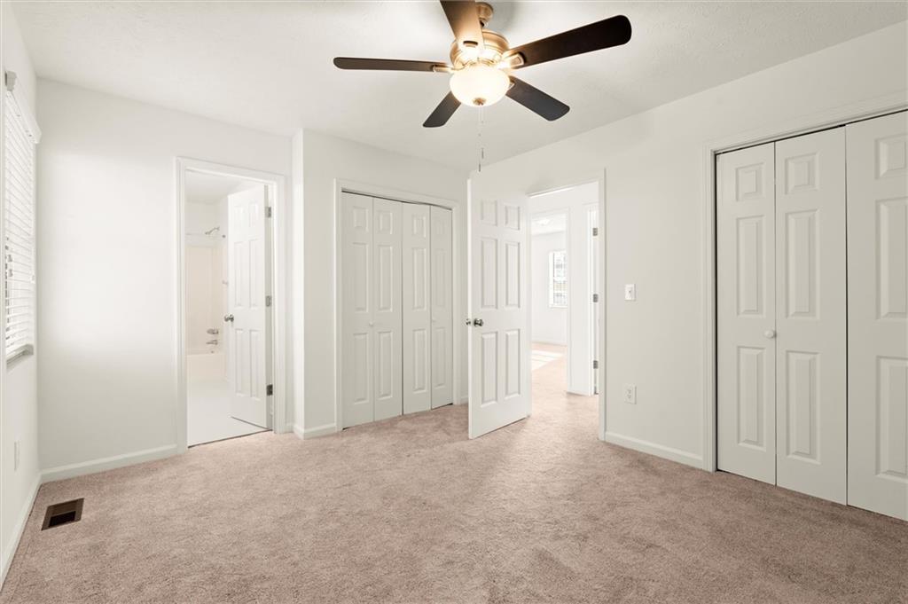 5984 Brookside Court Southeast Mableton, GA 30126 - Photo 9 of 21 a view of empty room with ceiling fan