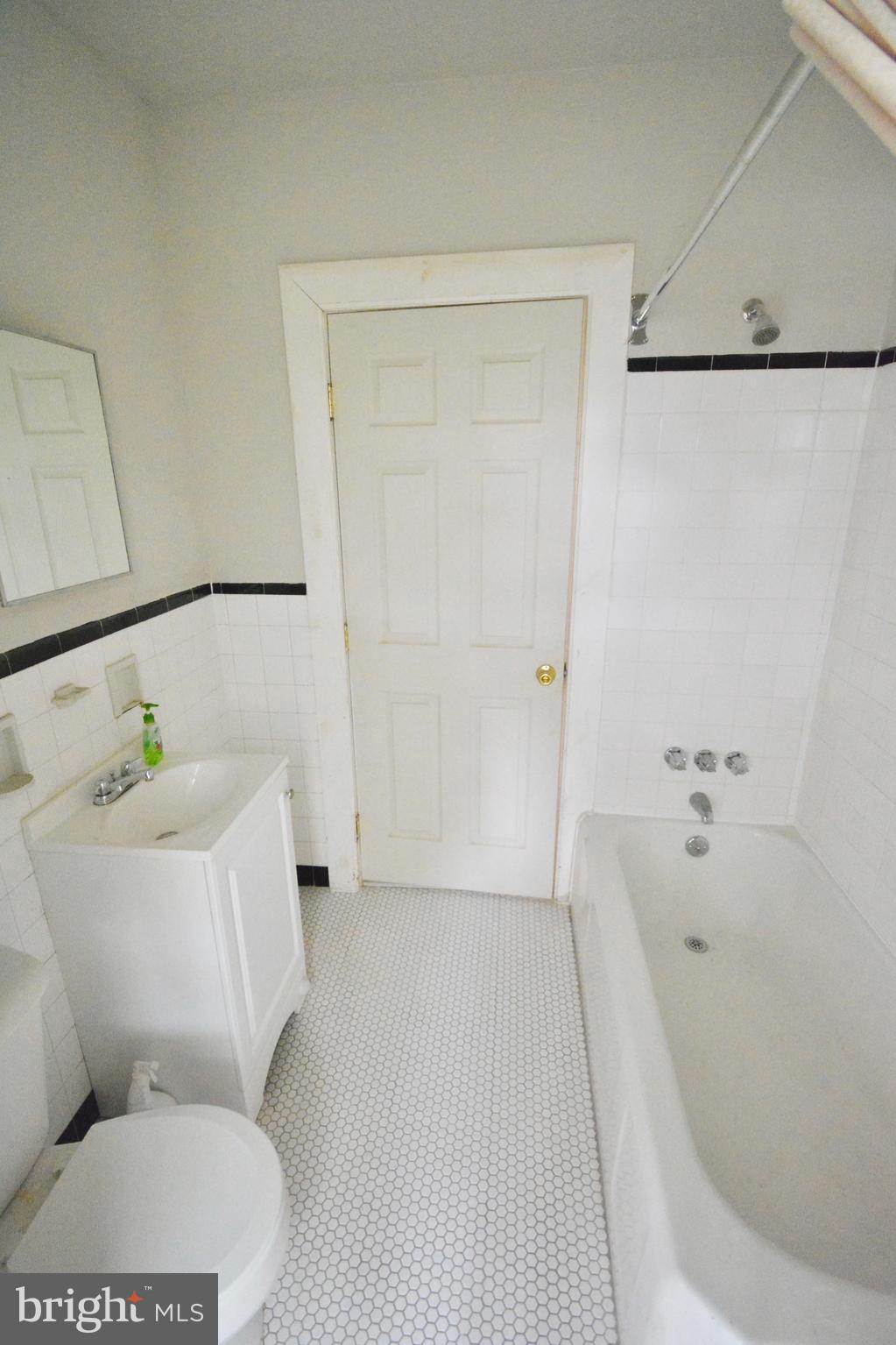 130 Manheim Street, Unit 3 Philadelphia, PA 19144 - Photo 13 of 14 a bathroom with a bathtub and shower