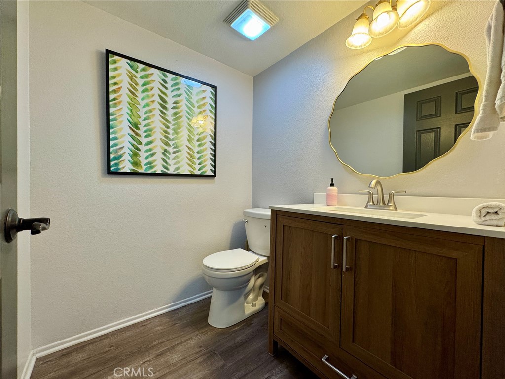 21 North Slope Lane Pomona, CA 91766 - Photo 21 of 48 a bathroom with a sink and a mirror
