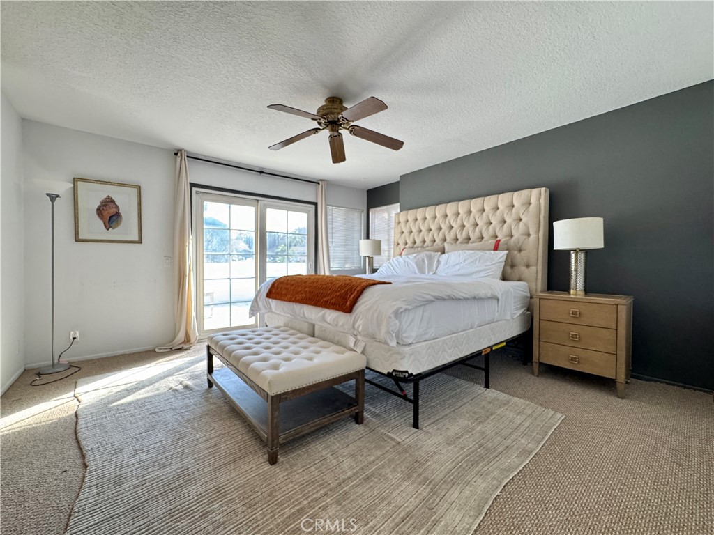 21 North Slope Lane Pomona, CA 91766 - Photo 24 of 48 a bedroom with furniture and a large window