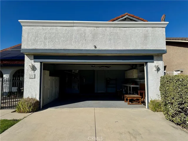 a view of outdoor space and front view of a house