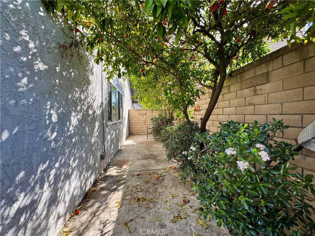 21 North Slope Lane Pomona, CA 91766 - Photo 48 of 48 a pathway of a house with large trees