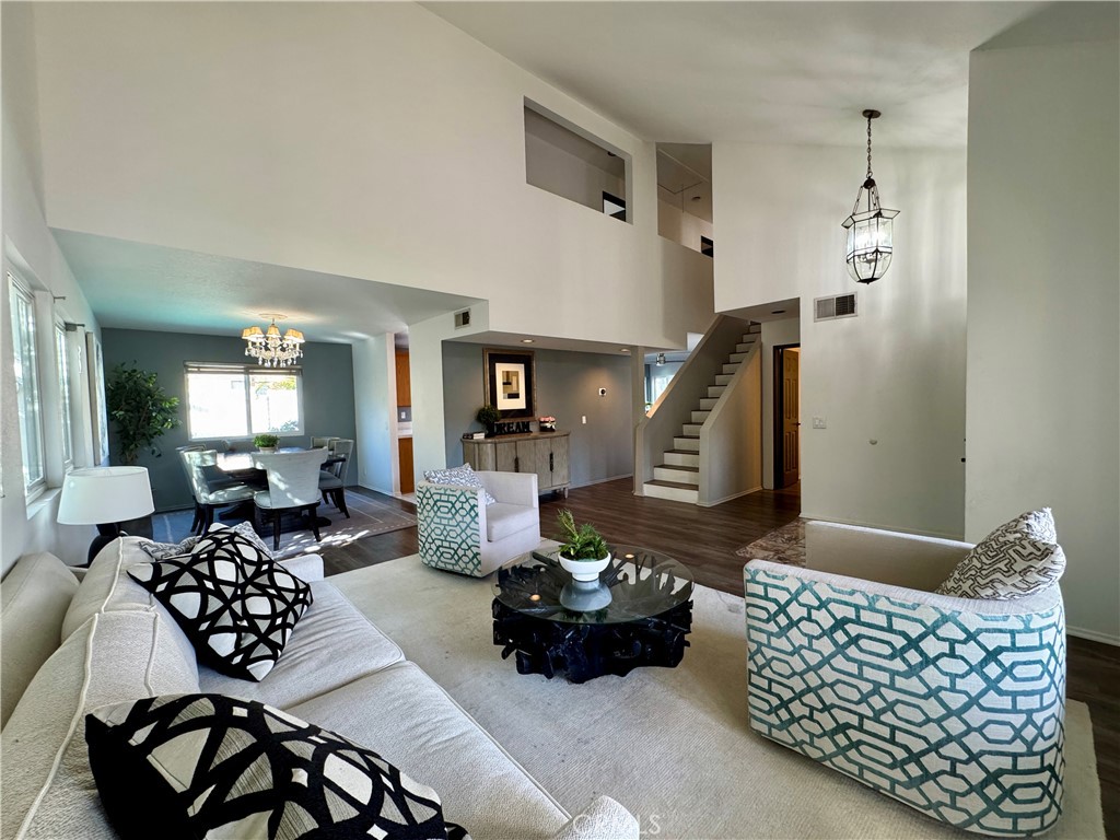 21 North Slope Lane Pomona, CA 91766 - Photo 5 of 48 a living room with furniture and wooden floor