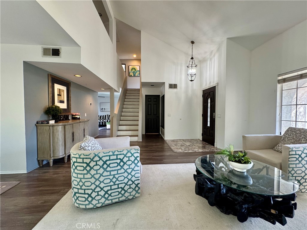 21 North Slope Lane Pomona, CA 91766 - Photo 7 of 48 a living room with furniture and a fireplace