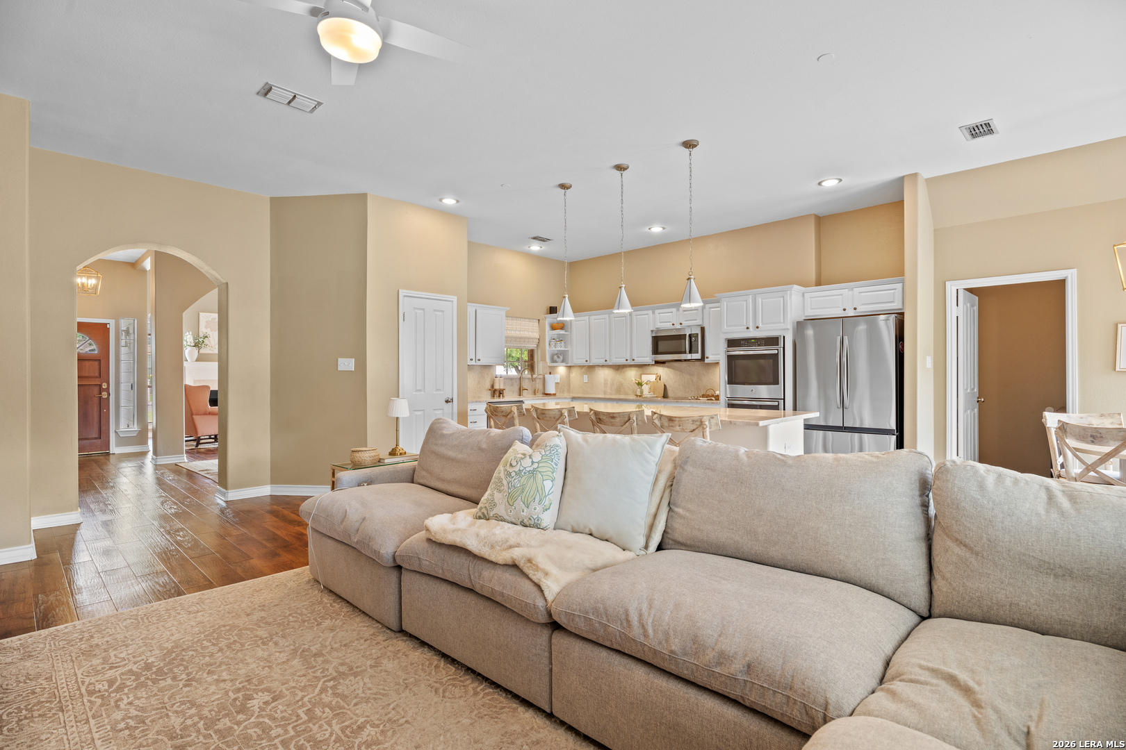 29314 Sumpter Drive Fair Oaks Ranch, TX 78015 - Photo 14 of 44 a living room with furniture and kitchen view
