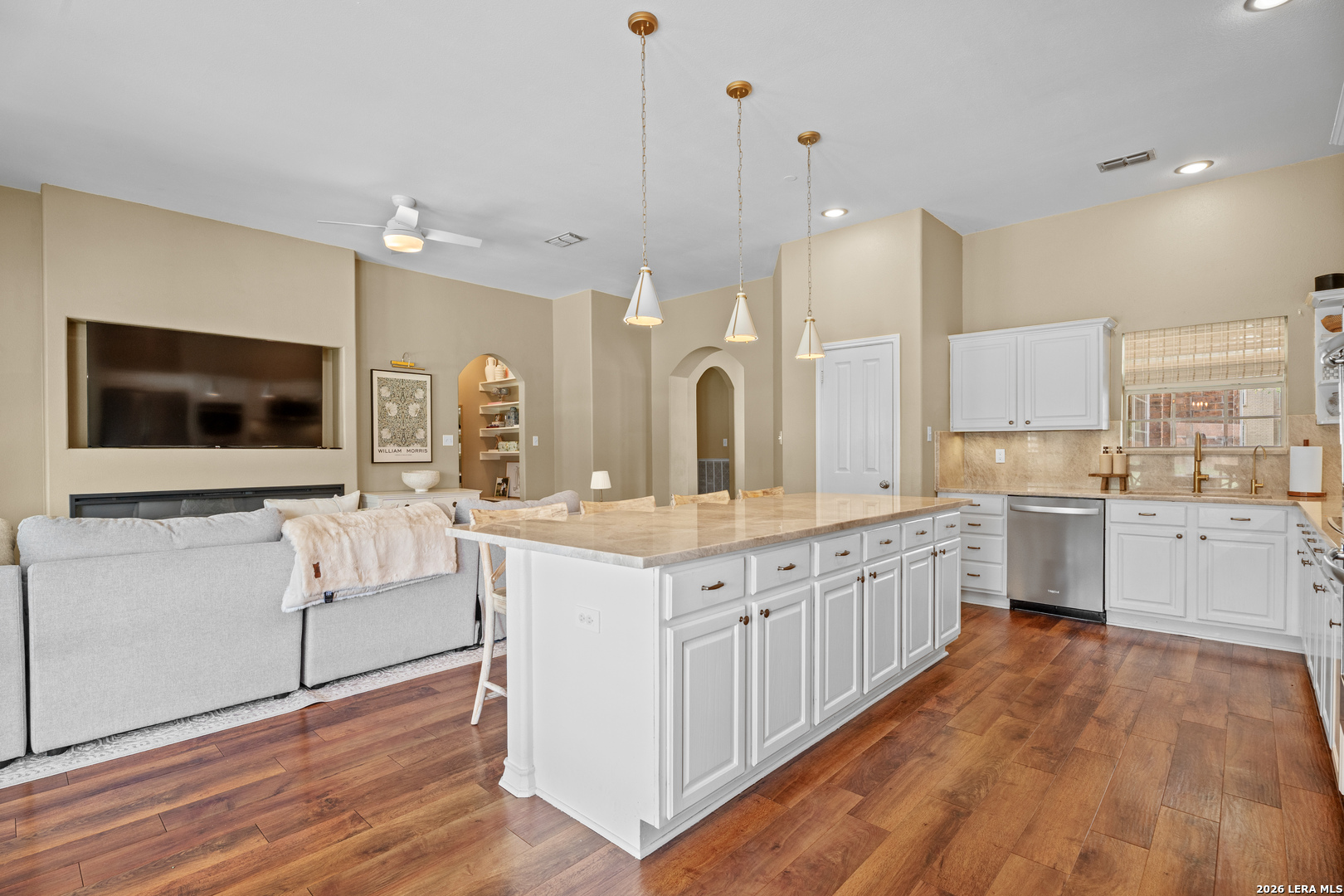 29314 Sumpter Drive Fair Oaks Ranch, TX 78015 - Photo 19 of 44 a large kitchen with cabinets and wooden floor