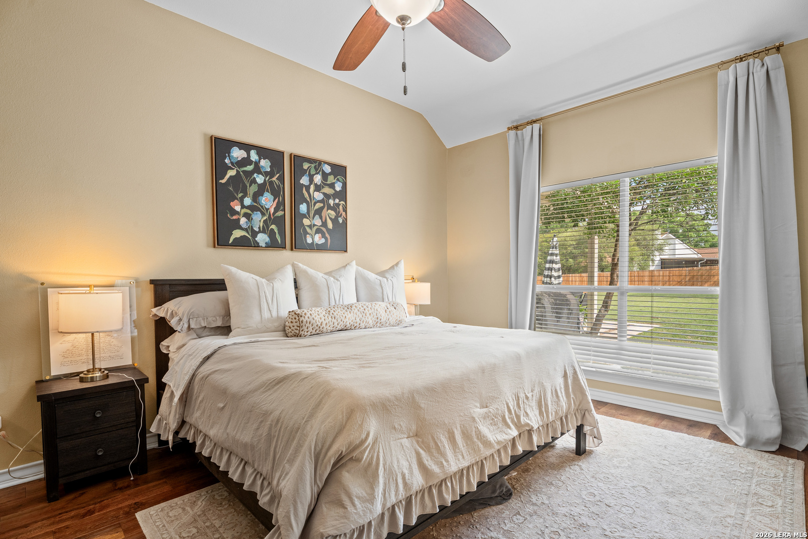 29314 Sumpter Drive Fair Oaks Ranch, TX 78015 - Photo 21 of 44 a bedroom with bed and a large window