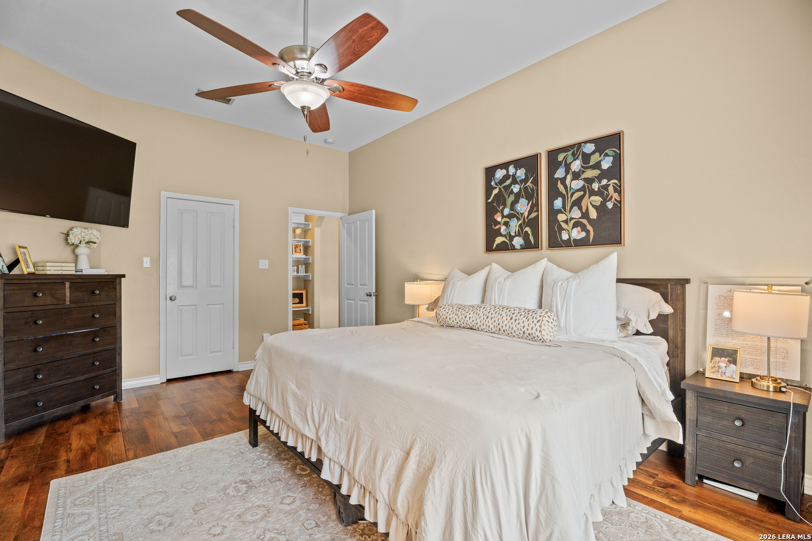 29314 Sumpter Drive Fair Oaks Ranch, TX 78015 - Photo 22 of 44 a bedroom with a bed and a flat screen tv