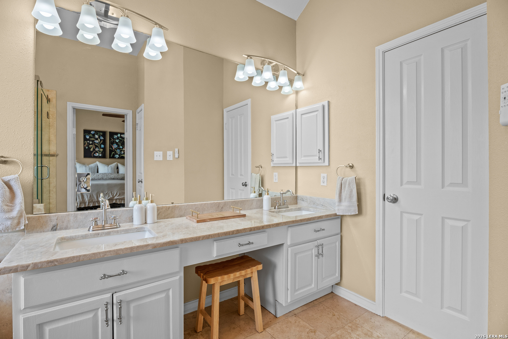 29314 Sumpter Drive Fair Oaks Ranch, TX 78015 - Photo 24 of 44 a spacious bathroom with a granite countertop double vanity sink a mirror and a