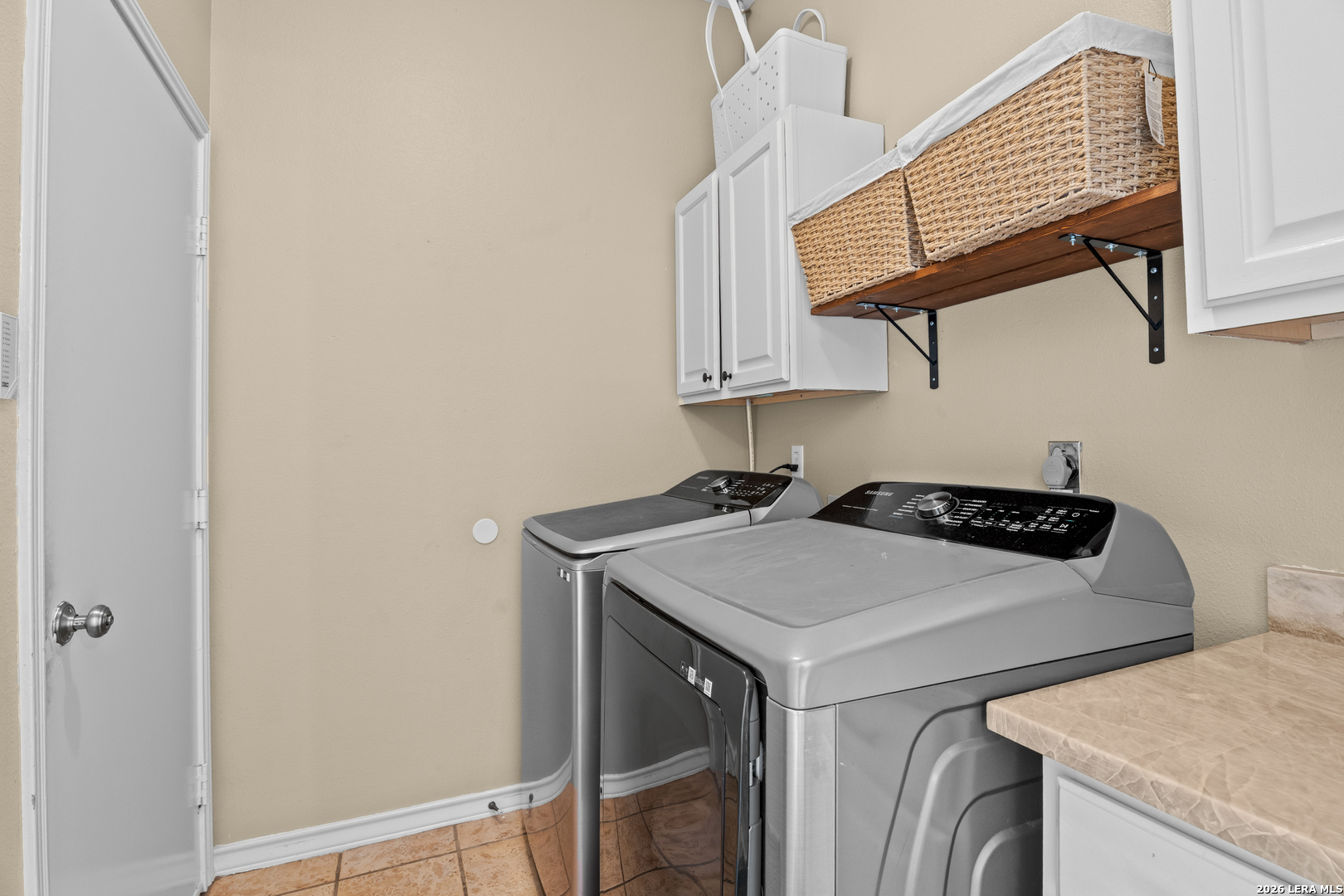 29314 Sumpter Drive Fair Oaks Ranch, TX 78015 - Photo 29 of 44 a utility room with dryer and washer