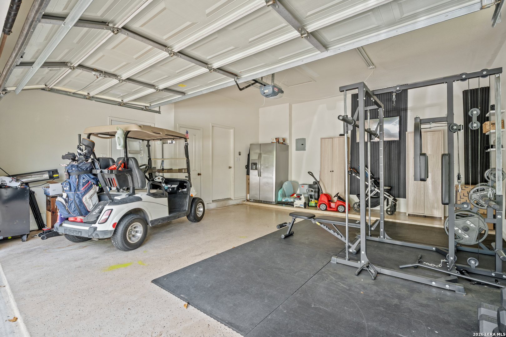 29314 Sumpter Drive Fair Oaks Ranch, TX 78015 - Photo 30 of 44 a view of a room with gym equipment