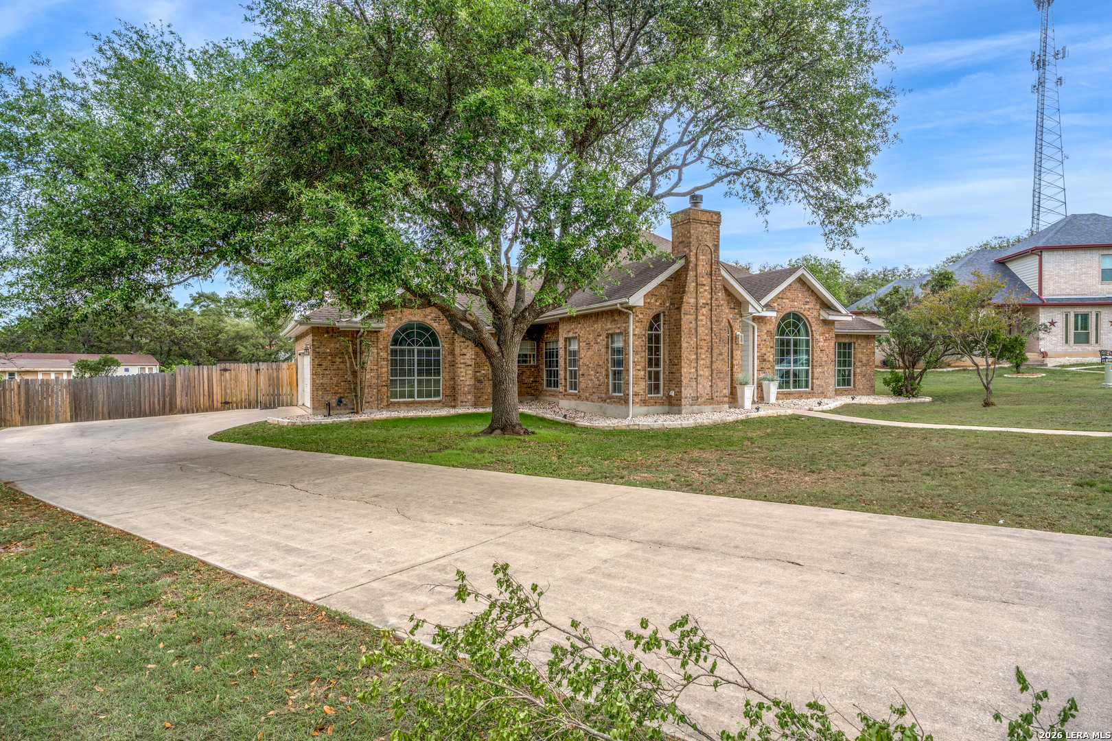 29314 Sumpter Drive Fair Oaks Ranch, TX 78015 - Photo 3 of 44 a front view of house with yard and green space