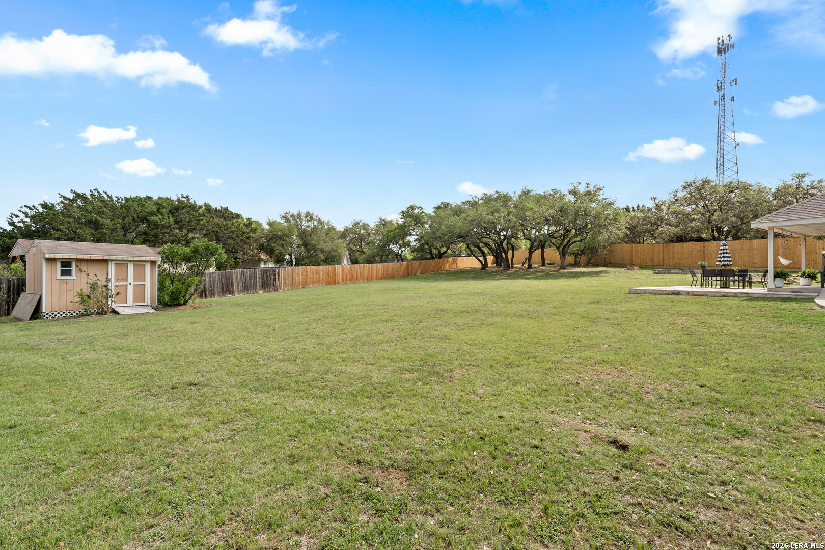 29314 Sumpter Drive Fair Oaks Ranch, TX 78015 - Photo 36 of 44 a view of a big yard with a house