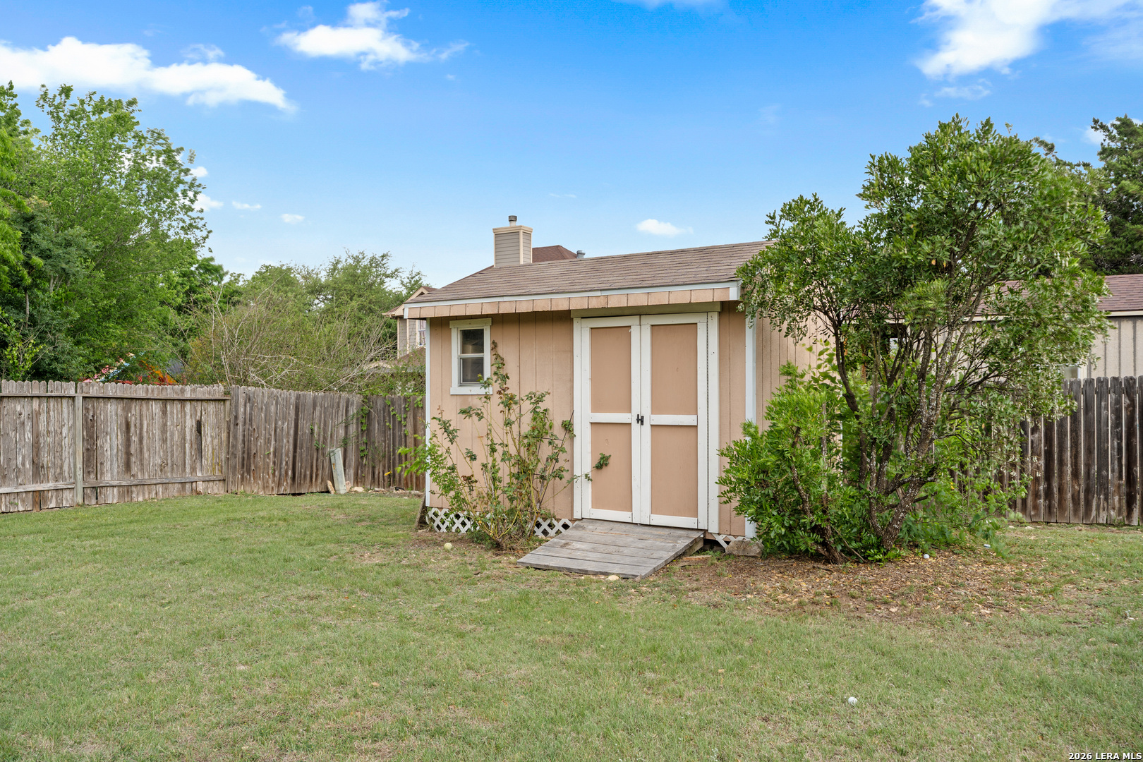 29314 Sumpter Drive Fair Oaks Ranch, TX 78015 - Photo 39 of 44 a view of a house with a yard and sitting area