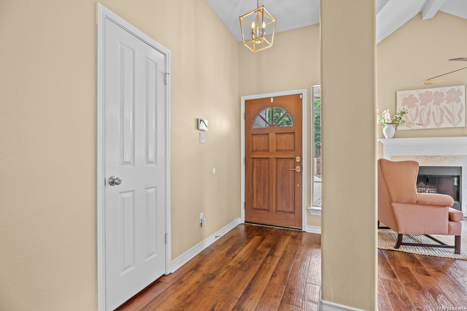 29314 Sumpter Drive Fair Oaks Ranch, TX 78015 - Photo 5 of 44 a view of a hallway with wooden floor and staircase