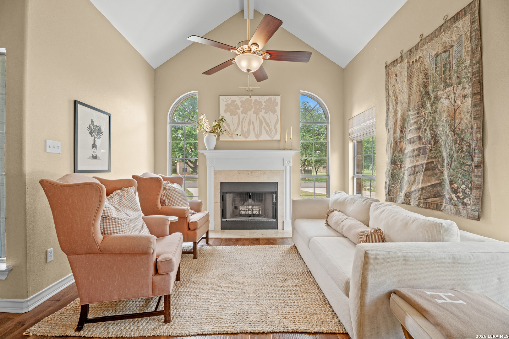 29314 Sumpter Drive Fair Oaks Ranch, TX 78015 - Photo 8 of 44 a living room with furniture and a fireplace