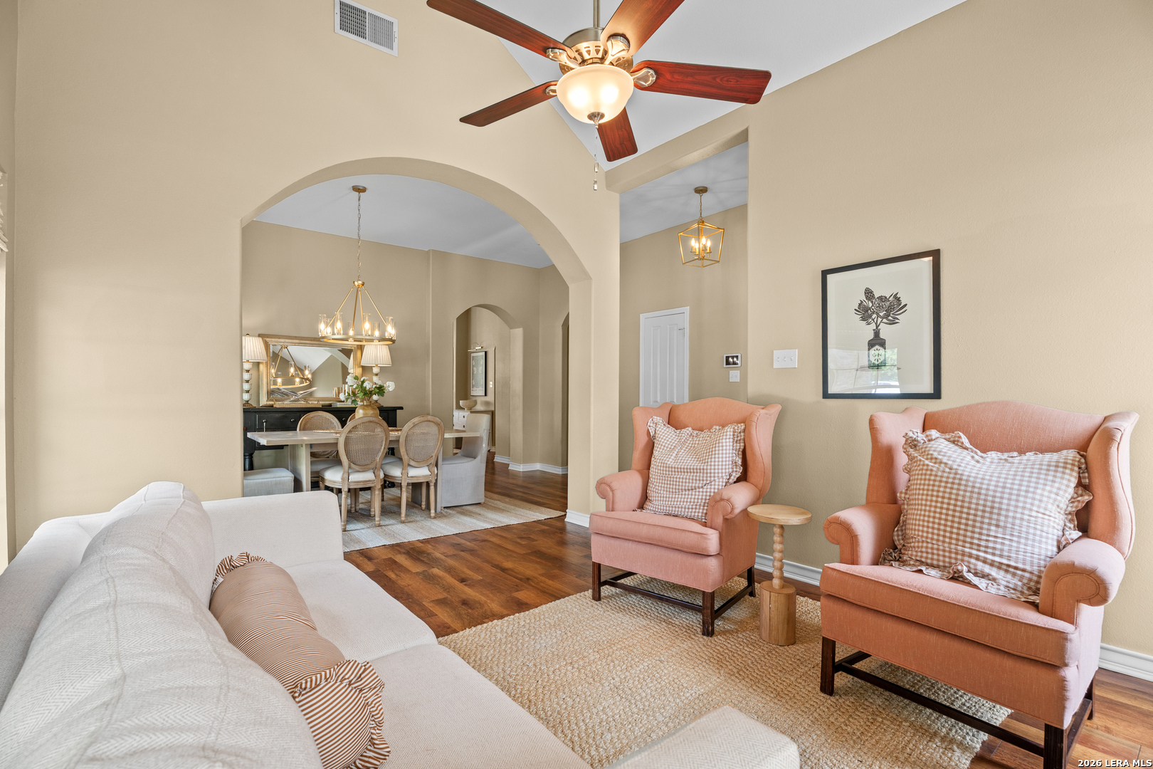 29314 Sumpter Drive Fair Oaks Ranch, TX 78015 - Photo 9 of 44 a living room with furniture and a chandelier