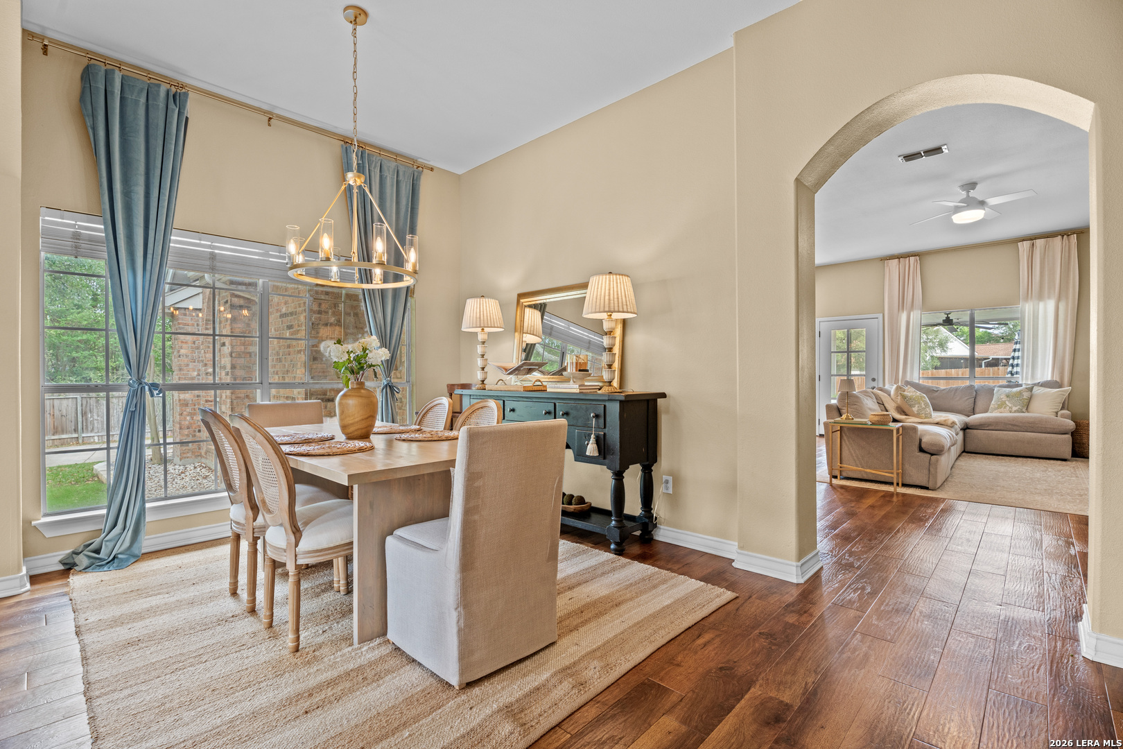 29314 Sumpter Drive Fair Oaks Ranch, TX 78015 - Photo 10 of 44 a dining room with wooden floor a glass table and chairs