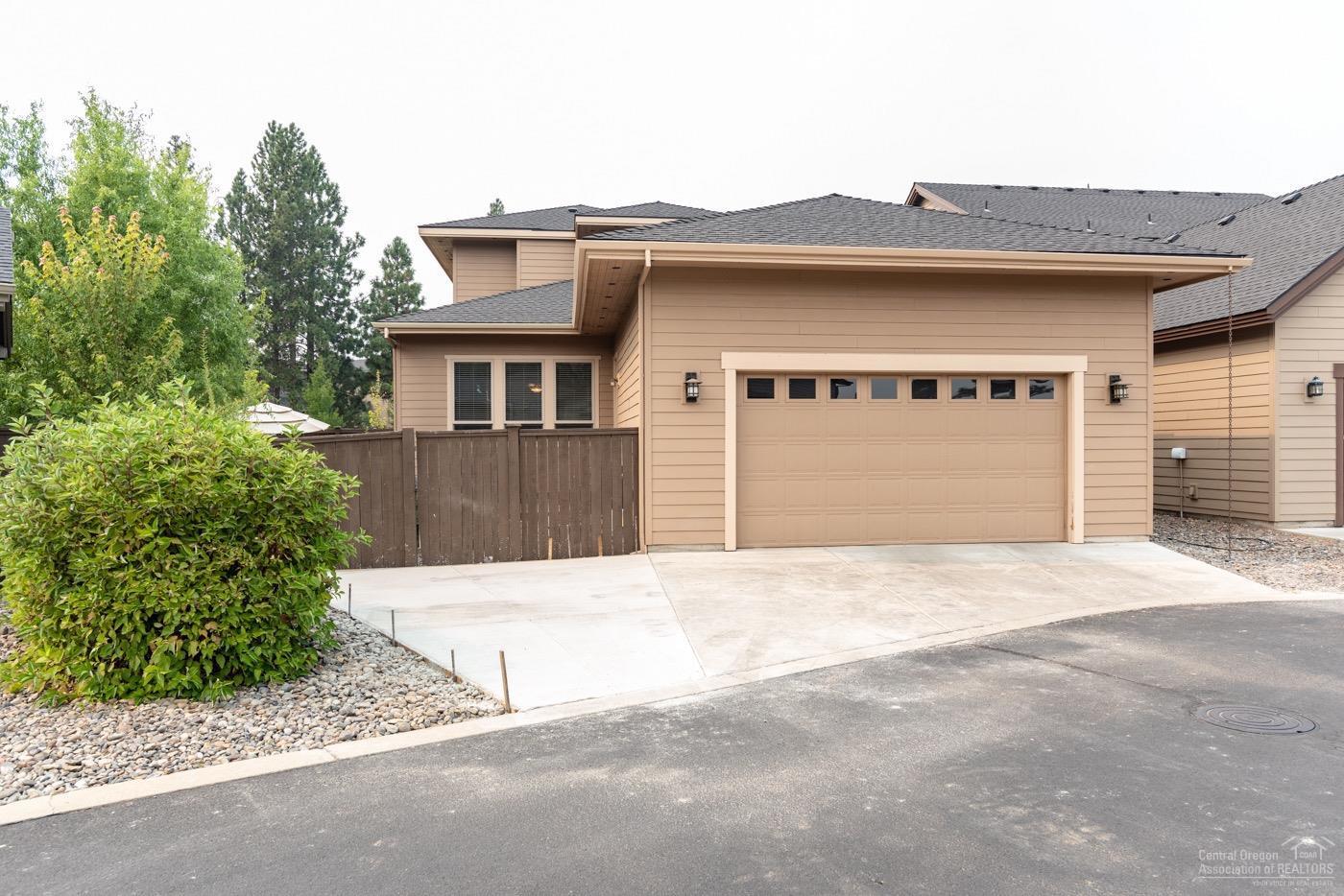 61118 Aspen Rim Lane Bend, OR 97702 - Photo 23 of 25 Extra paved parking on side of the garag
