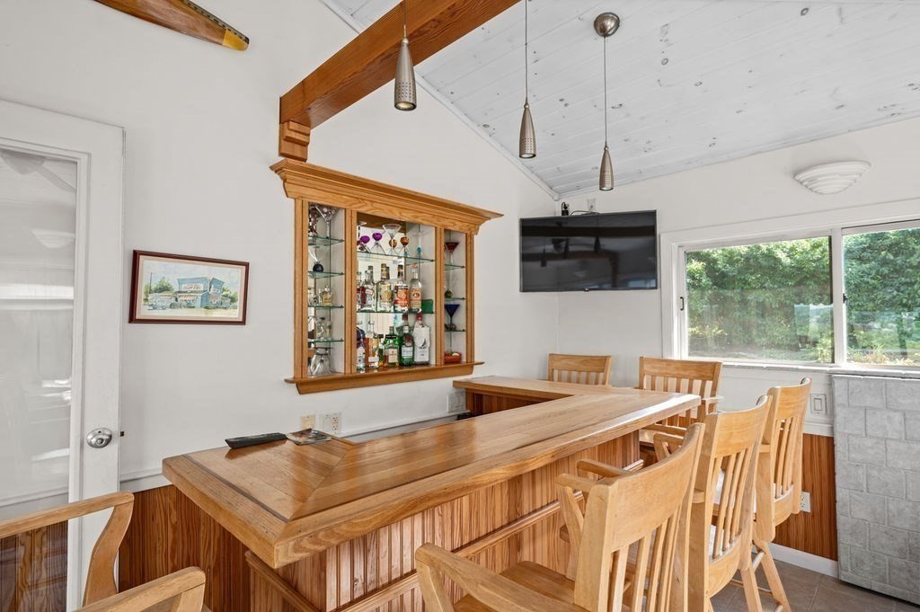 22 Little Neck Road Ipswich, MA 01938 - Photo 13 of 37 a view of a dining room with furniture window and outside view