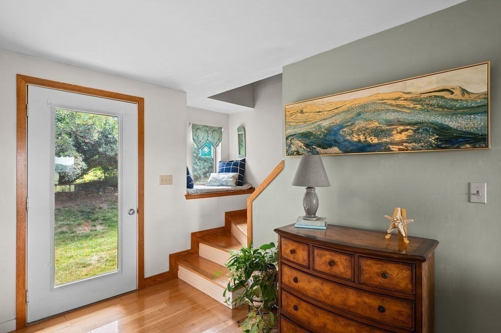 22 Little Neck Road Ipswich, MA 01938 - Photo 21 of 37 a living room with furniture and a large window