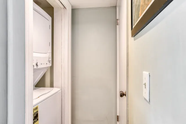 a view of a bathroom from a hallway