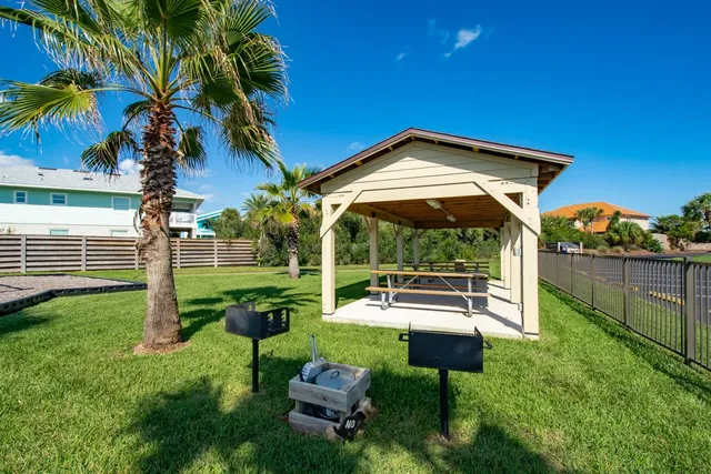 a view of a chairs in a yard