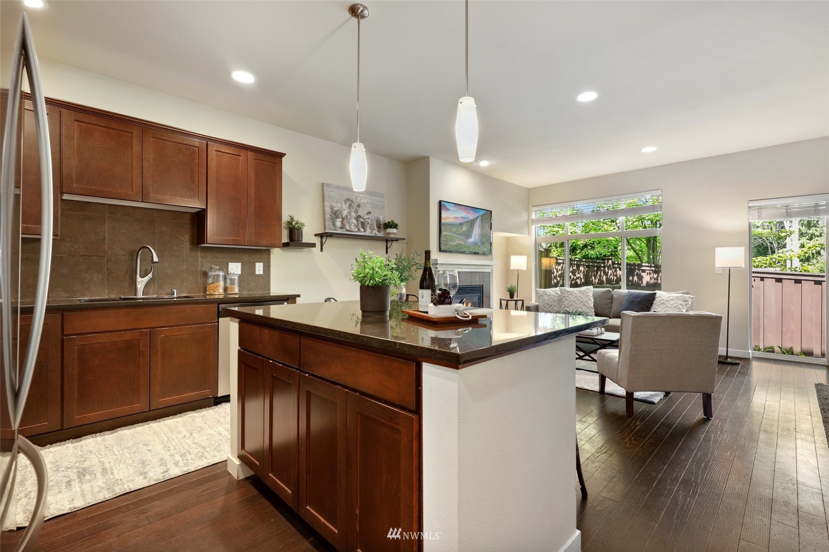 221 164th Place Southeast Bothell, WA 98012 - Photo 11 of 30 a kitchen with a sink a counter space appliances and cabinets
