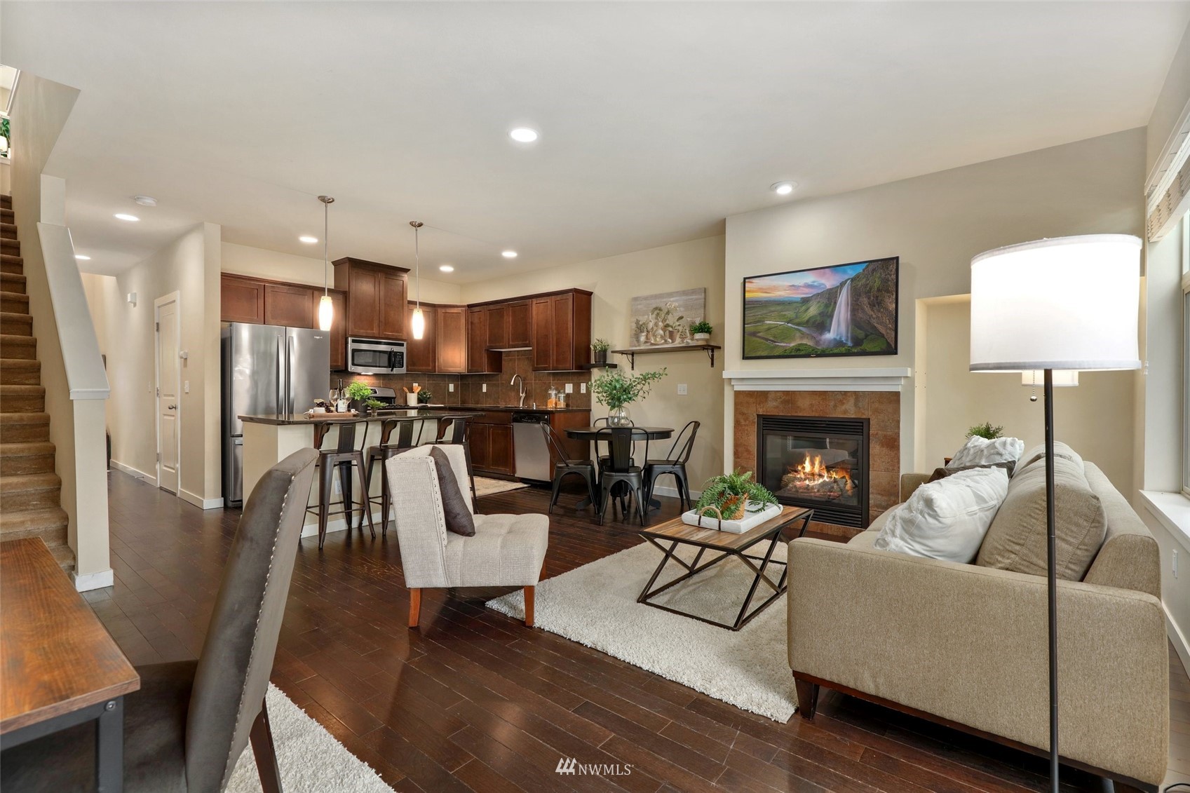221 164th Place Southeast Bothell, WA 98012 - Photo 15 of 30 a living room with furniture and a fireplace