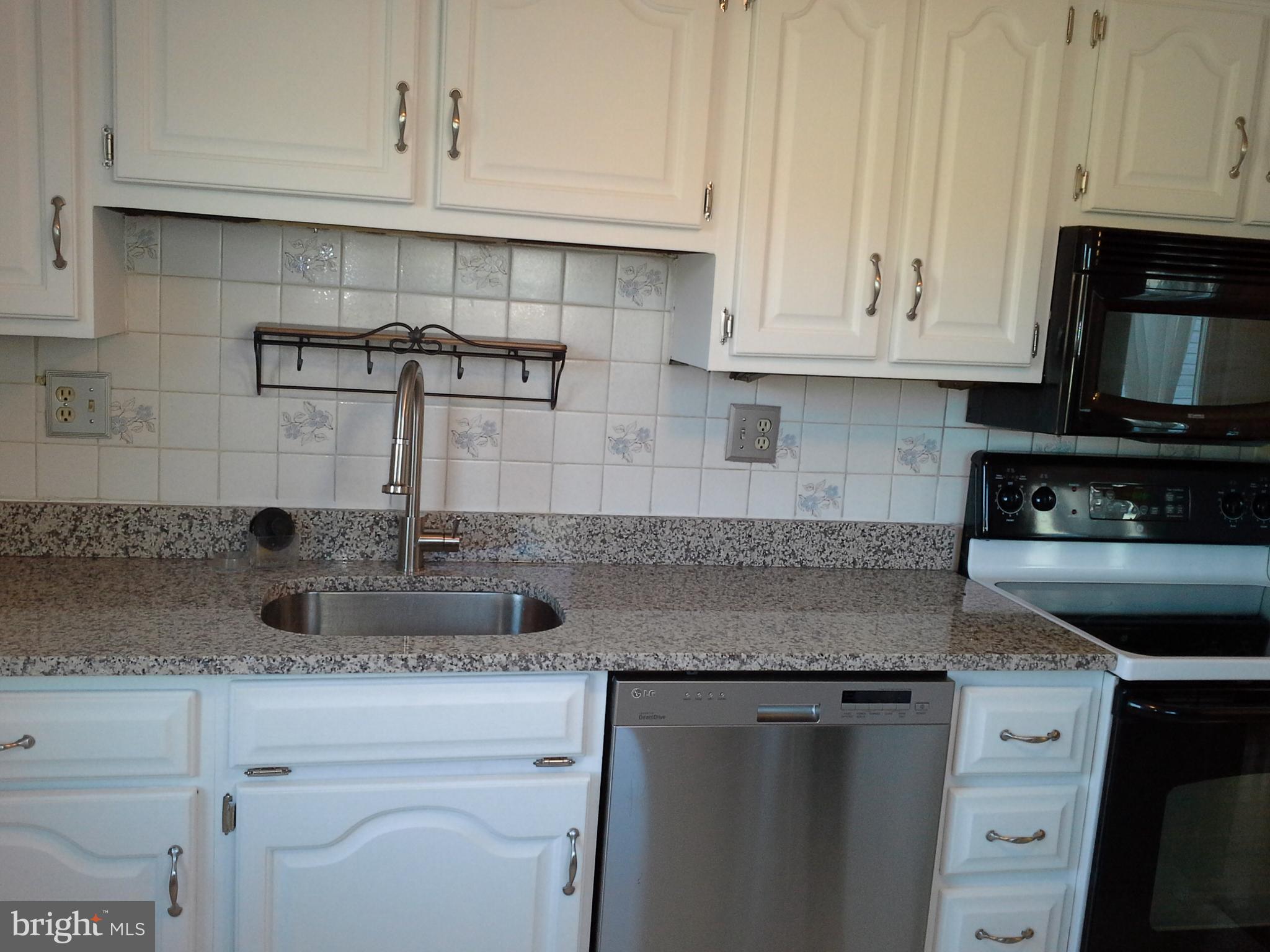 9315 Beowulf Circle Baltimore, MD 21237 - Photo 11 of 28 Like NewBright Kitchen