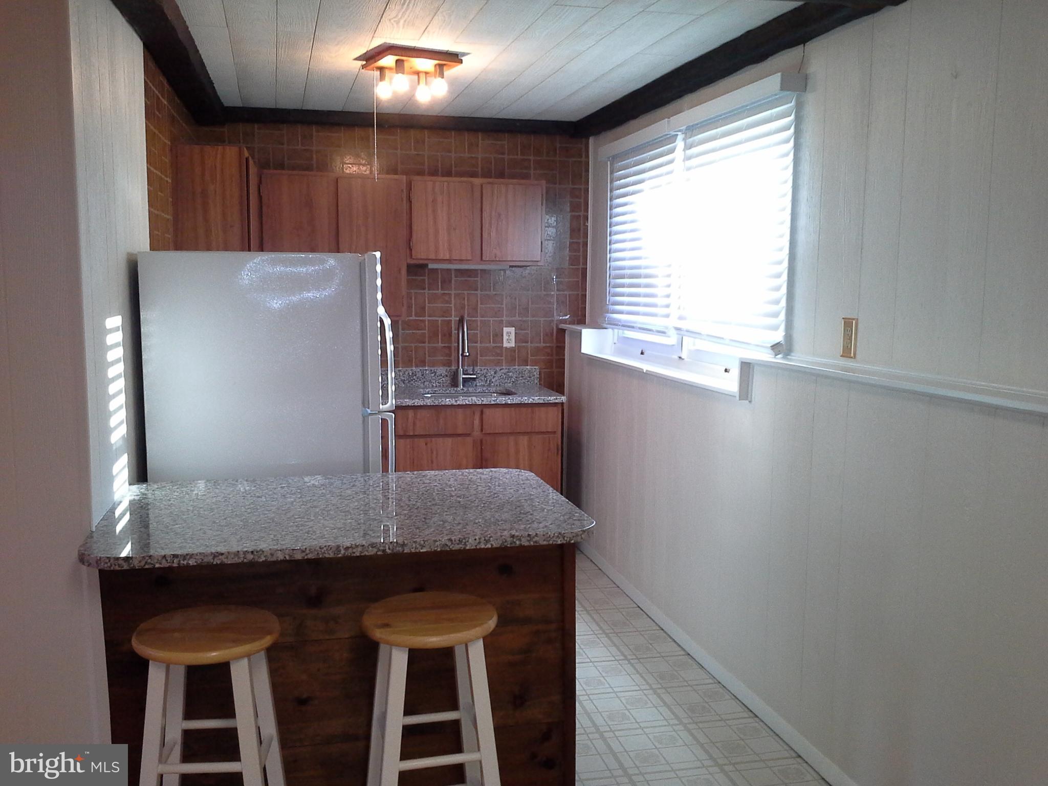 9315 Beowulf Circle Baltimore, MD 21237 - Photo 20 of 28 Serving kitchen with water and and sink in Fmlyrm