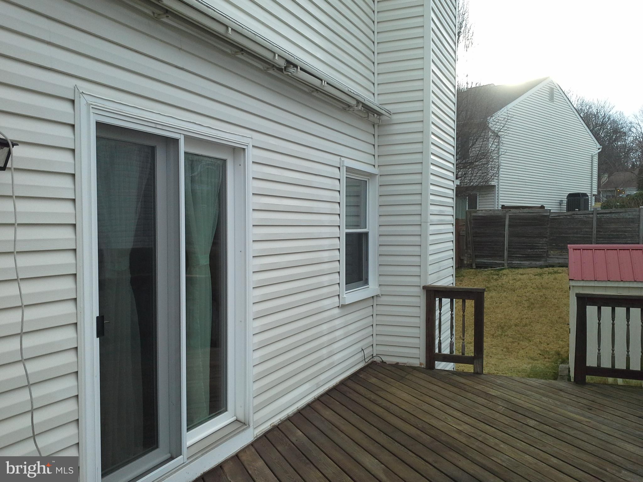 9315 Beowulf Circle Baltimore, MD 21237 - Photo 7 of 28 Beautiful deck with retractable awning